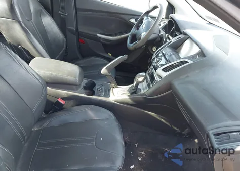 2013 Ford Focus Se z USA, uszkodzony, nr VIN 1FADP3F2XDL103511